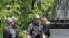 Russia -- Police check a passenger of a bus on the road to far eastern city of Vladivostok, 10Jun2010